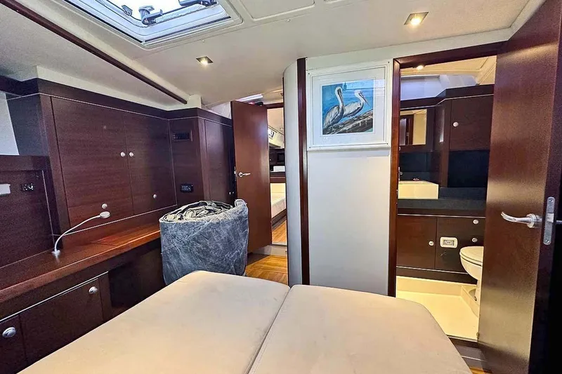 Slide: The Image of Luxurious interior of 2010 Hanse 545 yacht with elegant wood finishes and modern amenities. - 25