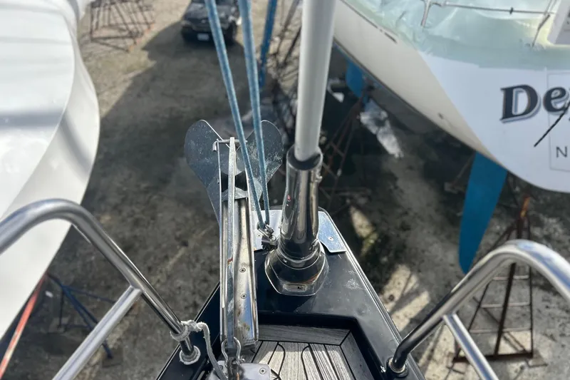 Slide: The Image of Bow view of a 2010 Hanse 545 yacht with anchor and rigging. - 3