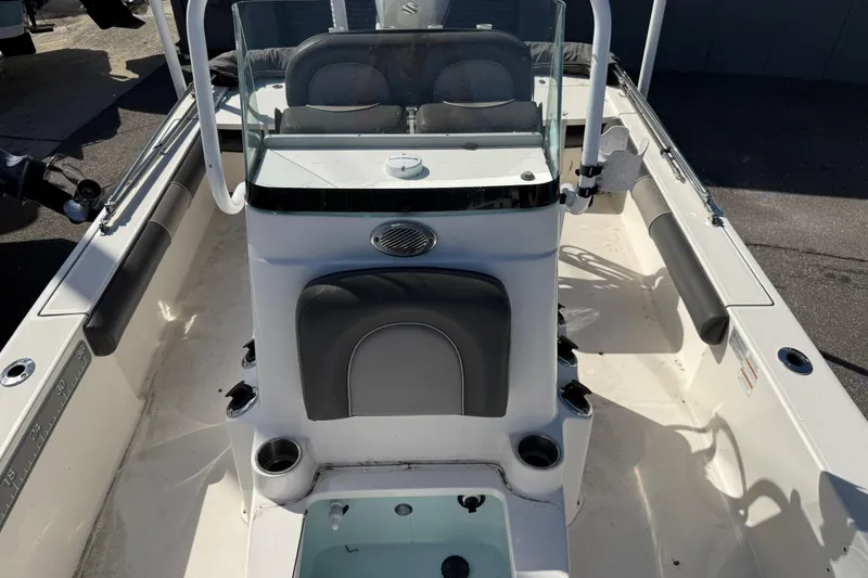Slide: The Image of 2021 Sea Born FX24 Bay boat interior with seating and console view. - 13
