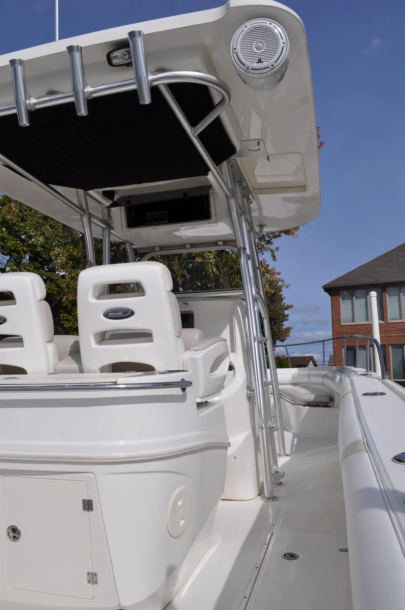 Slide: The Image of 2006 Boston Whaler 320 Outrage boat, side view. - 13