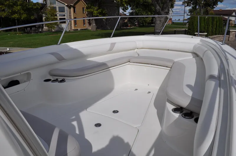 Slide: The Image of 2006 Boston Whaler 320 Outrage boat interior seating area. - 14
