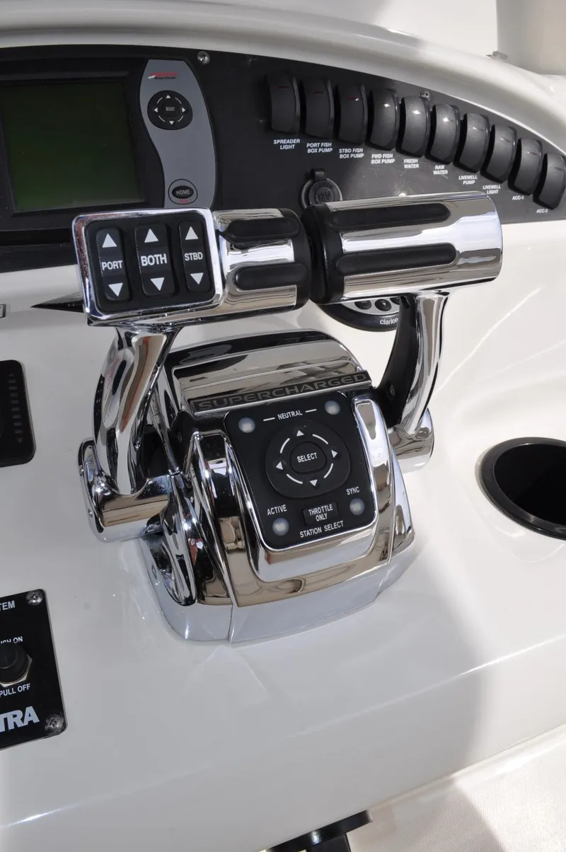 Slide: The Image of Control console of a 2006 Boston Whaler 320 Outrage boat. - 9