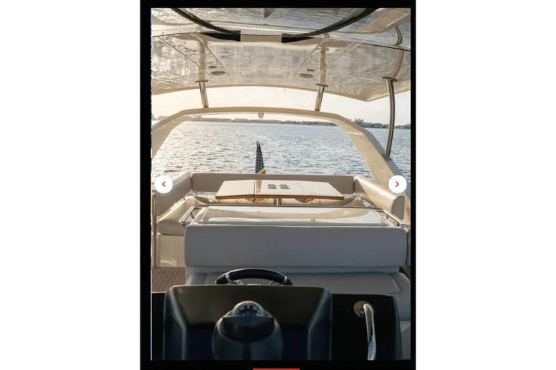 Slide: The Image of Aquila 44 Yacht 2018 interior with ocean view, featuring sleek design and comfortable seating. - 16