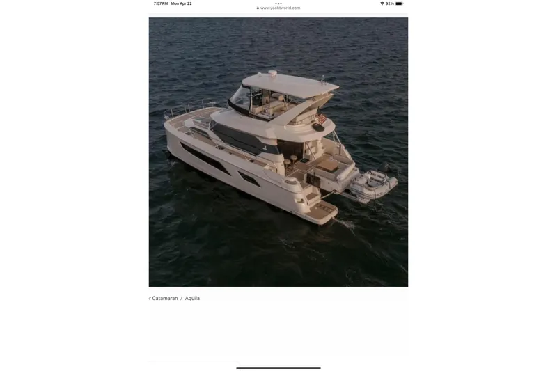 Slide: The Image of 2018 Aquila 44 Yacht cruising on open water at sunset. - 34