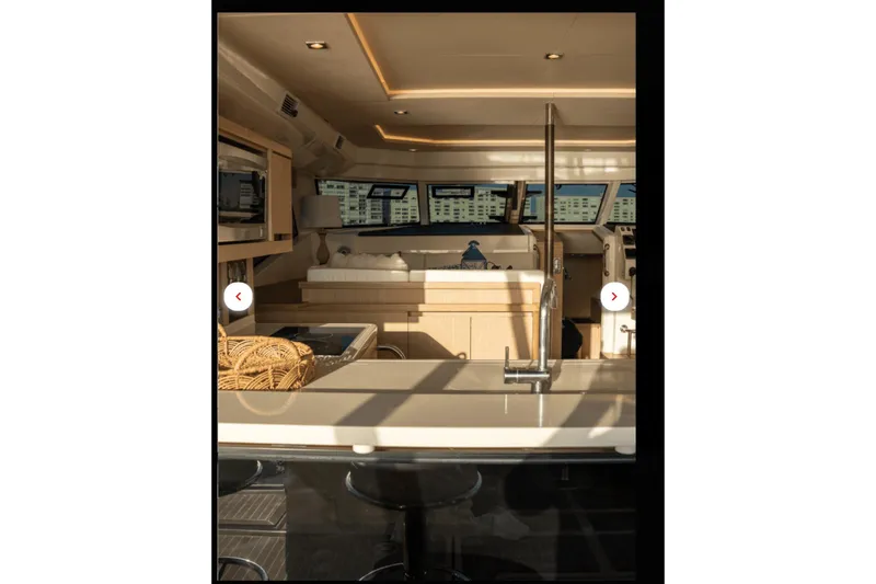 Slide: The Image of Luxurious interior of 2018 Aquila 44 Yacht with modern kitchen and seating area. - 6