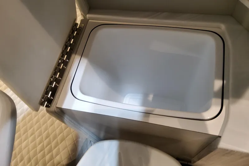 Slide: The Image of 2026 Formula 360 Crossover Bowrider OB interior storage compartment detail. - 104