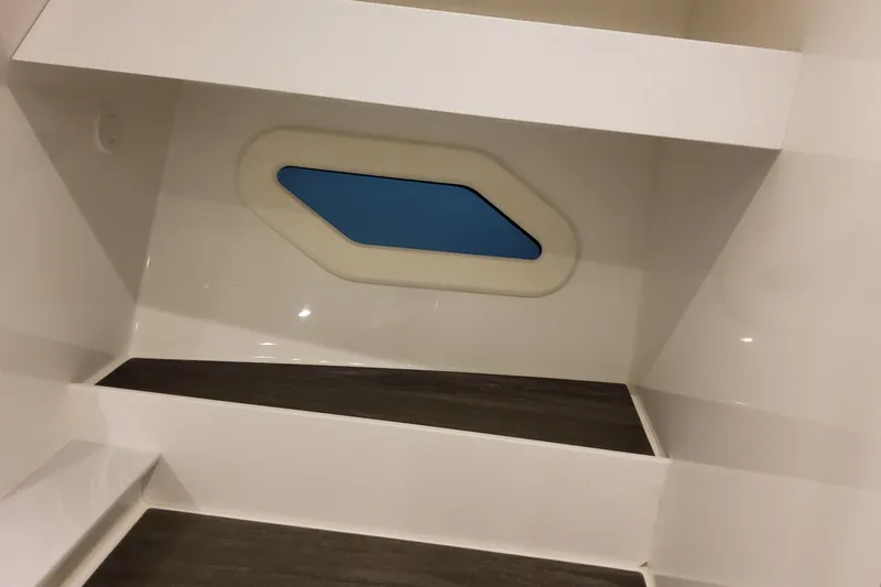 Slide: The Image of Interior of 2026 Formula 360 Crossover Bowrider OB with modern design and window. - 111