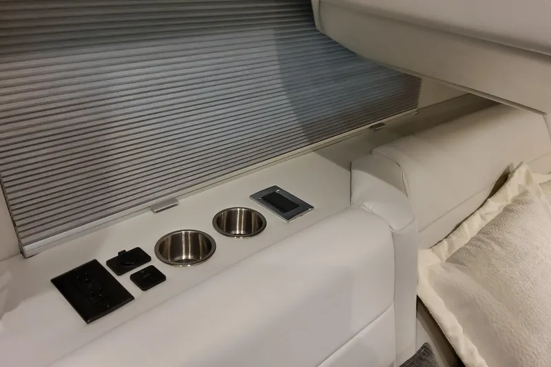 Slide: The Image of Interior of 2026 Formula 360 Crossover Bowrider OB with cup holders and controls. - 117