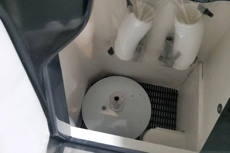 Slide: The Image of Interior view of 2026 Formula 360 Crossover Bowrider OB boat compartment. - 121