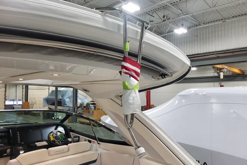 Slide: The Image of 2026 Formula 360 Crossover Bowrider OB interior in a warehouse setting. - 124