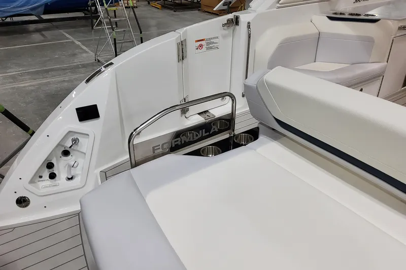 Slide: The Image of 2026 Formula 360 Crossover Bowrider OB interior with seating and cup holders. - 19