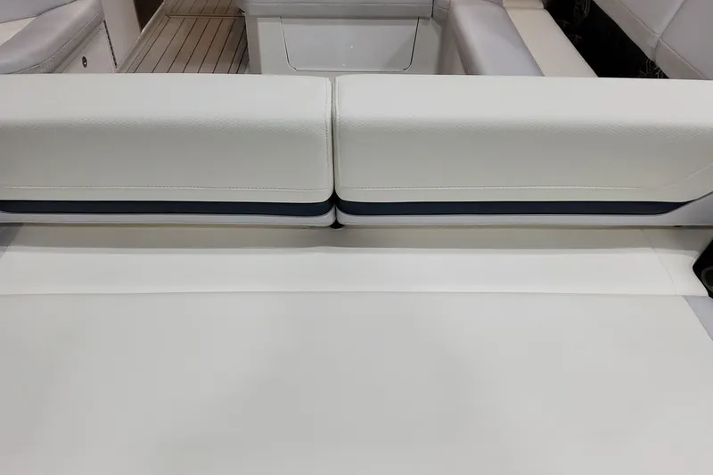 Slide: The Image of 2026 Formula 360 Crossover Bowrider OB interior seating, featuring sleek white upholstery. - 20