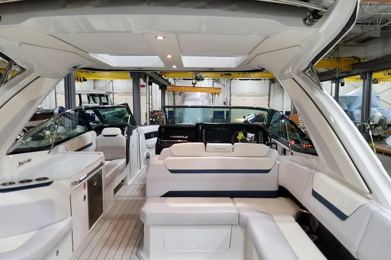 Slide: The Image of Interior of 2026 Formula 360 Crossover Bowrider OB, showcasing luxurious seating and modern design. - 21