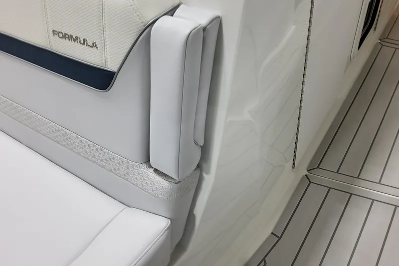 Slide: The Image of 2026 Formula 360 Crossover Bowrider OB interior, featuring sleek white seating and modern flooring. - 27