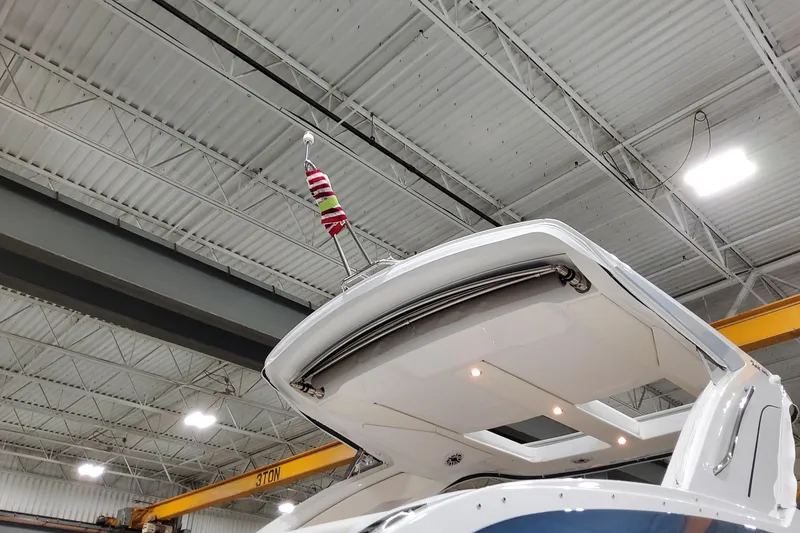 Slide: The Image of 2026 Formula 360 Crossover Bowrider OB in a warehouse, showcasing sleek design and modern features. - 3