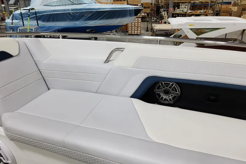 Slide: The Image of 2026 Formula 360 Crossover Bowrider OB interior with white seating and speaker detail. - 34