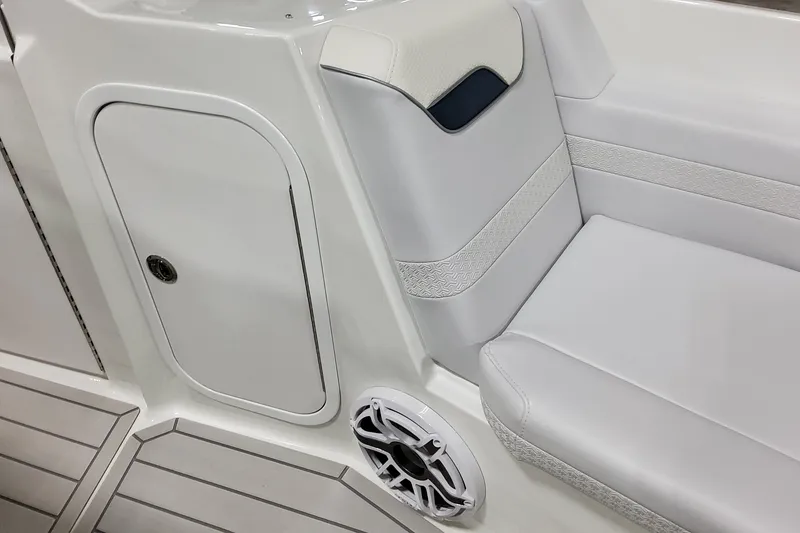 Slide: The Image of 2026 Formula 360 Crossover Bowrider OB interior with white seating and speaker detail. - 35