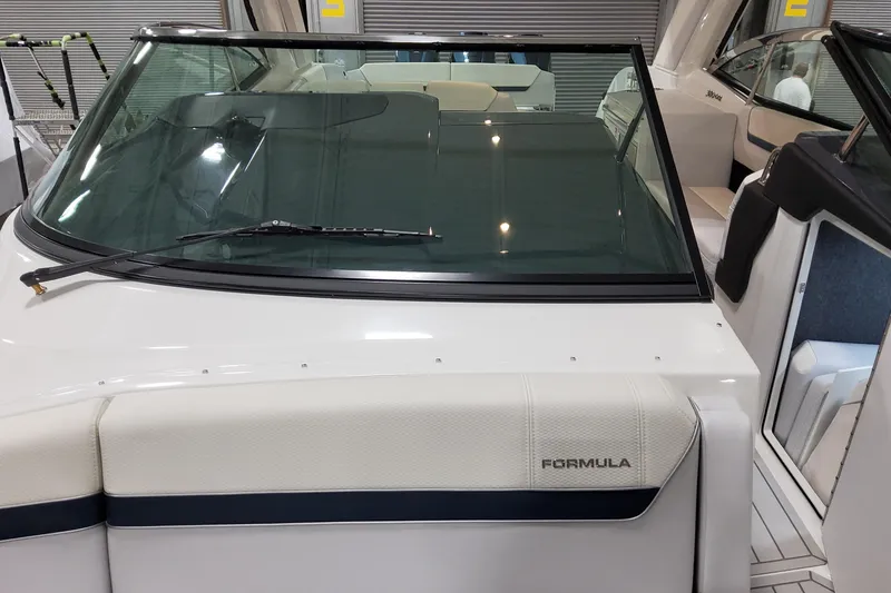 Slide: The Image of 2026 Formula 360 Crossover Bowrider OB with sleek windshield and modern interior design. - 40