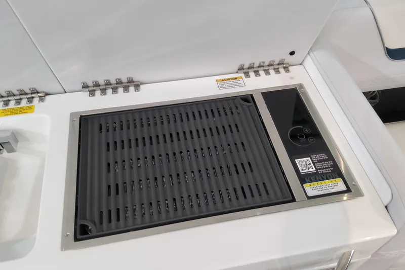Slide: The Image of Built-in grill on 2026 Formula 360 Crossover Bowrider OB boat. - 47
