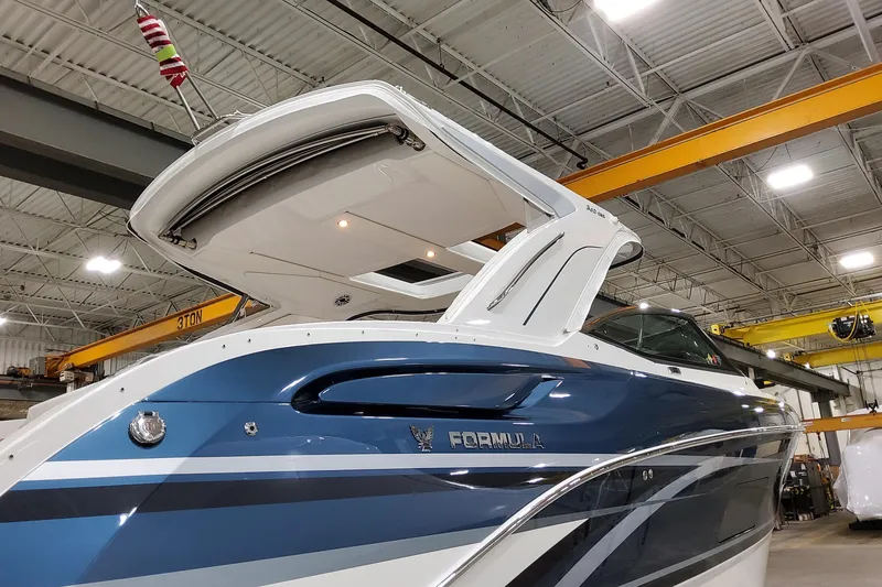 Slide: The Image of 2026 Formula 360 Crossover Bowrider OB in a warehouse, showcasing sleek design and modern features. - 5