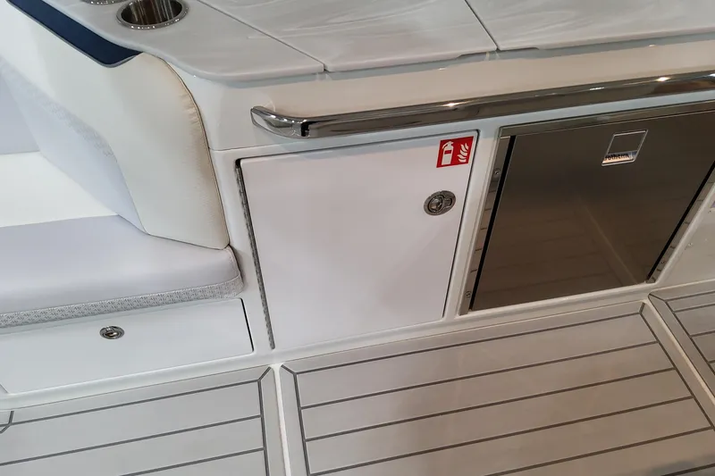 Slide: The Image of 2026 Formula 360 Crossover Bowrider OB interior with seating, storage, and stainless steel accents. - 50