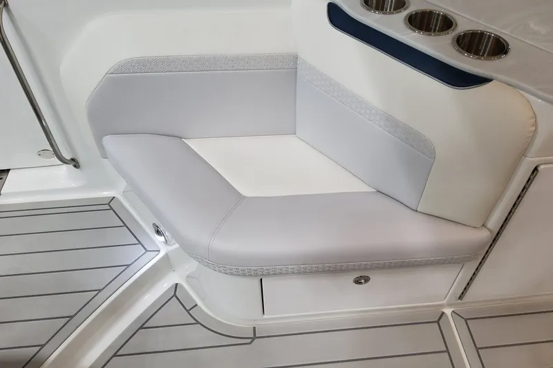 Slide: The Image of 2026 Formula 360 Crossover Bowrider OB interior seating with cup holders and sleek design. - 51