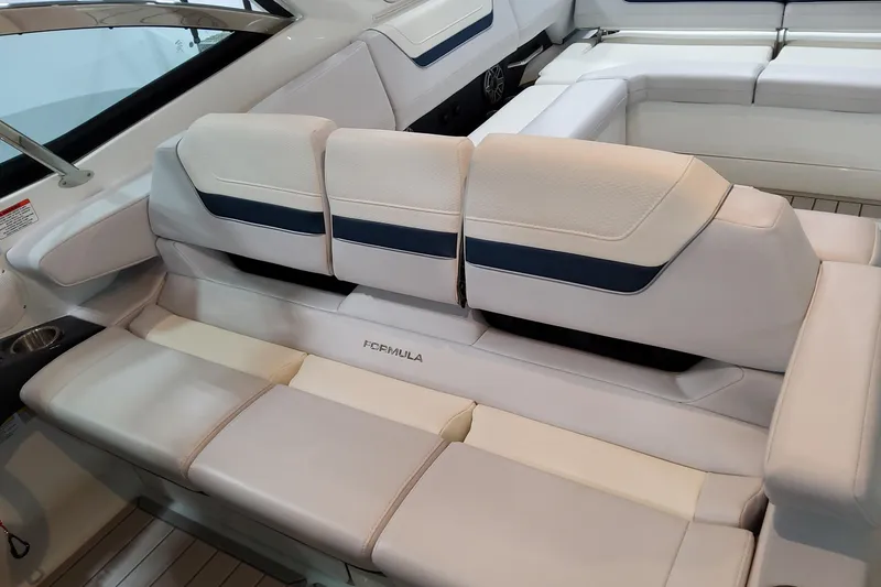 Slide: The Image of 2026 Formula 360 Crossover Bowrider OB interior seating with luxurious white upholstery. - 60