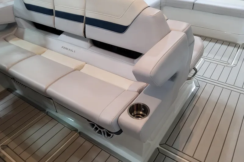 Slide: The Image of Luxurious seating on 2026 Formula 360 Crossover Bowrider OB with integrated cup holder. - 61