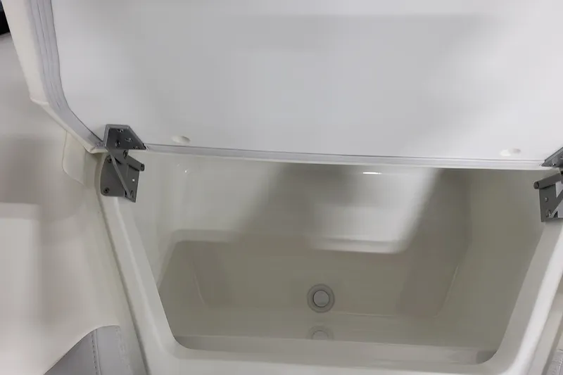 Slide: The Image of Storage compartment in 2026 Formula 360 Crossover Bowrider OB boat, featuring durable hinges. - 69