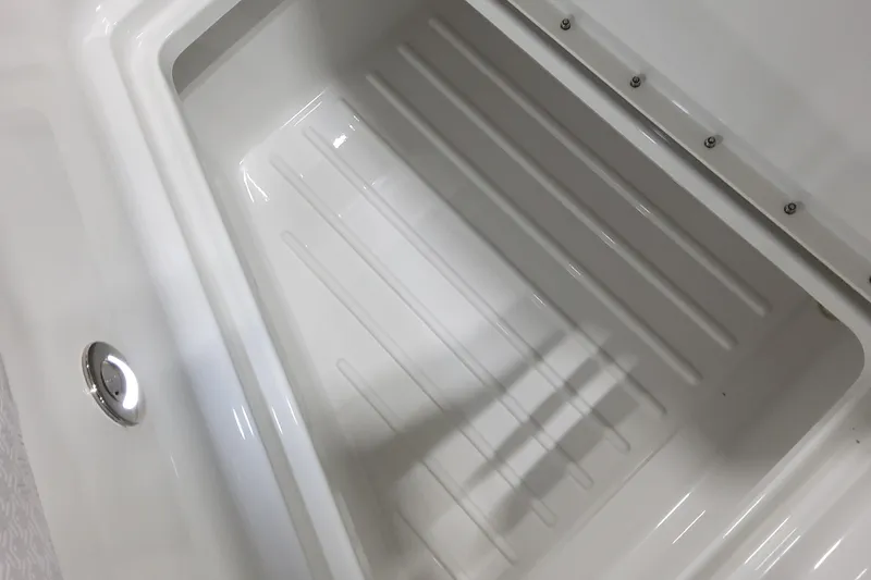 Slide: The Image of 2026 Formula 360 Crossover Bowrider OB storage compartment, featuring sleek white interior design. - 70