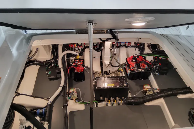 Slide: The Image of Engine compartment of 2026 Formula 360 Crossover Bowrider OB, showcasing wiring and components. - 72