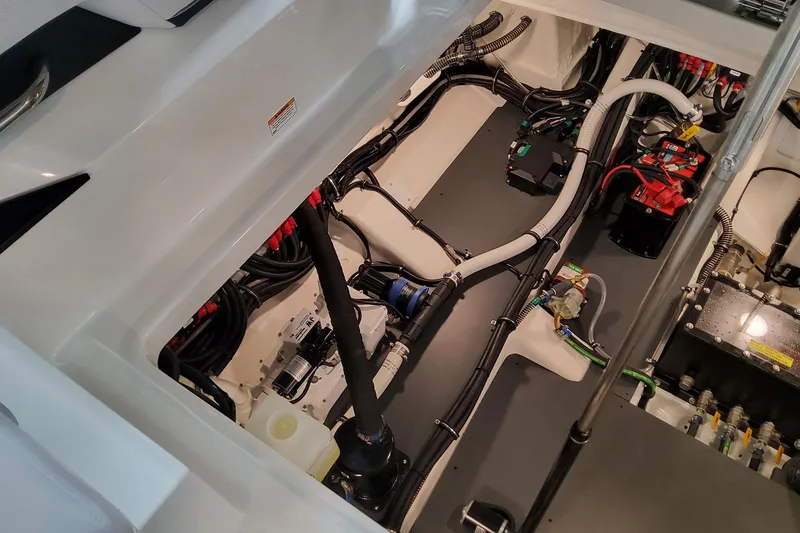 Slide: The Image of Engine compartment of 2026 Formula 360 Crossover Bowrider OB, showcasing wiring and components. - 74