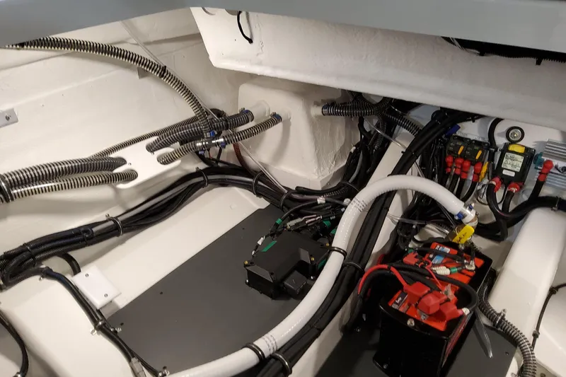 Slide: The Image of Engine compartment of 2026 Formula 360 Crossover Bowrider OB with wiring and components. - 76
