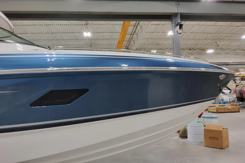 Slide: The Image of 2026 Formula 360 Crossover Bowrider OB in a warehouse setting. - 8