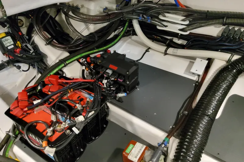 Slide: The Image of Engine compartment of 2026 Formula 360 Crossover Bowrider OB with wiring and battery systems. - 81