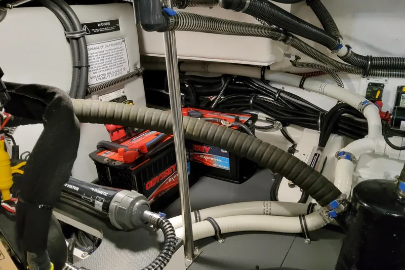 Slide: The Image of Engine compartment of 2026 Formula 360 Crossover Bowrider OB with Odyssey batteries and wiring. - 84