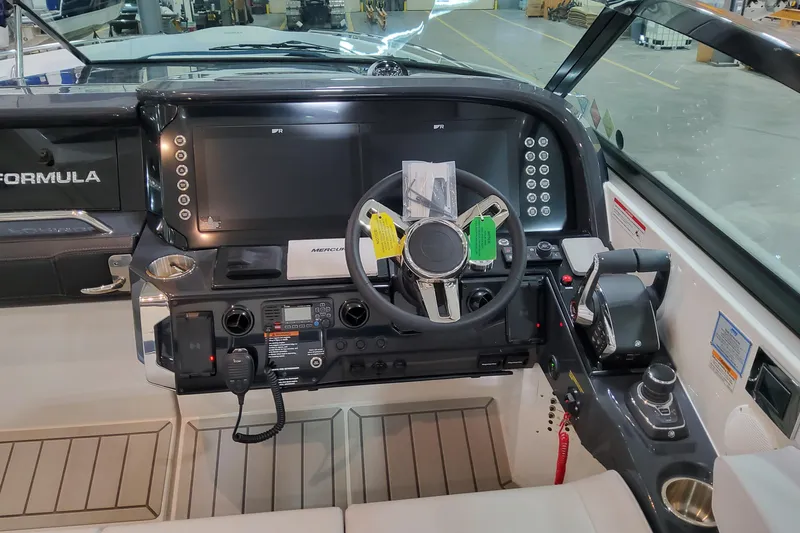 Slide: The Image of 2026 Formula 360 Crossover Bowrider OB dashboard with advanced controls and navigation system. - 87