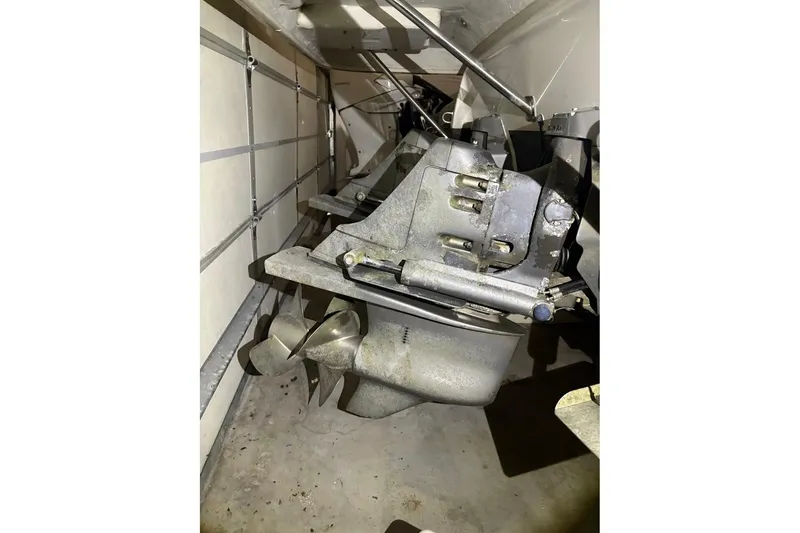 Slide: The Image of 2000 Cruisers Yachts 2870 Express boat propeller and drive system in storage. - 21