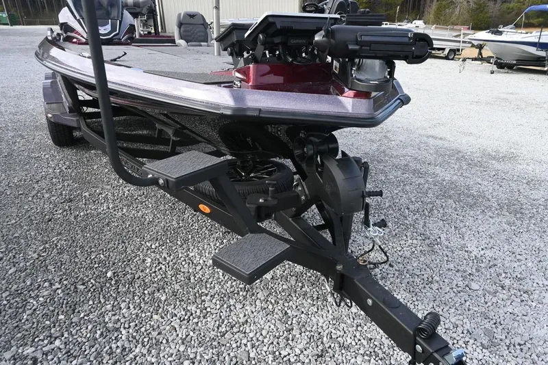 Slide: The Image of 2026 Vexus VXs20 boat on trailer, parked on gravel lot. - 6