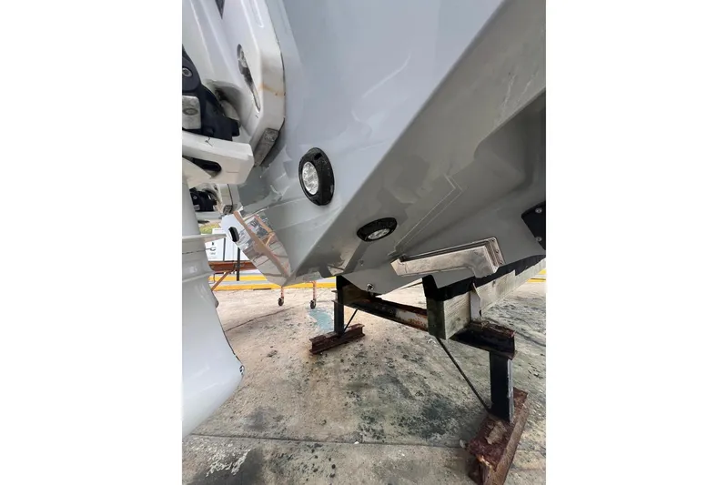 Slide: The Image of 2023 Valhalla Boatworks V-37 hull detail on stand, showcasing craftsmanship. - 11