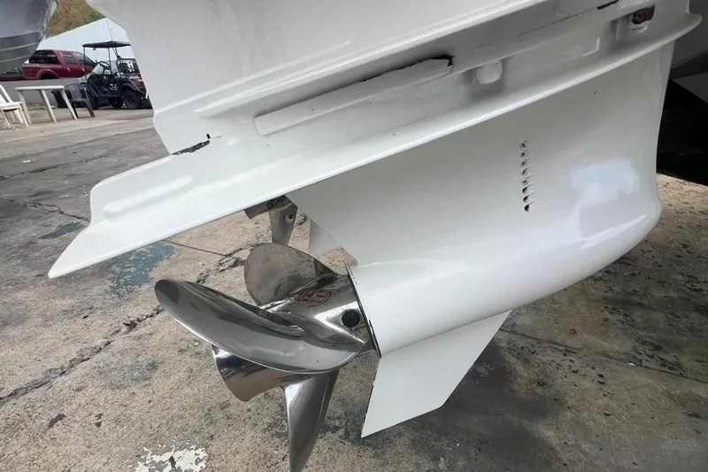 Slide: The Image of 2023 Valhalla Boatworks V-37 propeller and lower unit detail on concrete surface. - 13