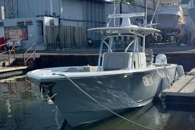 Slide: The Image of 2023 Valhalla Boatworks V-37 docked, showcasing sleek design and modern features. - 2