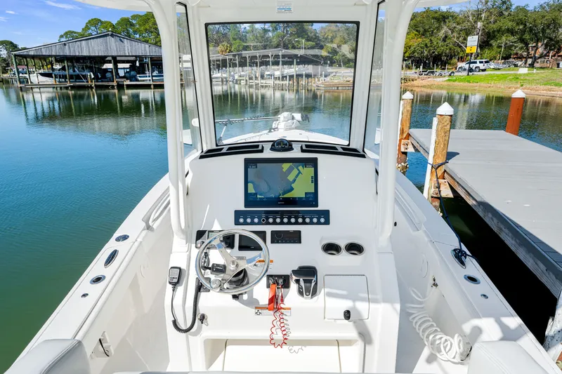 Slide: The Image of Interior view of 2021 Regulator 24XO boat at dock. - 12