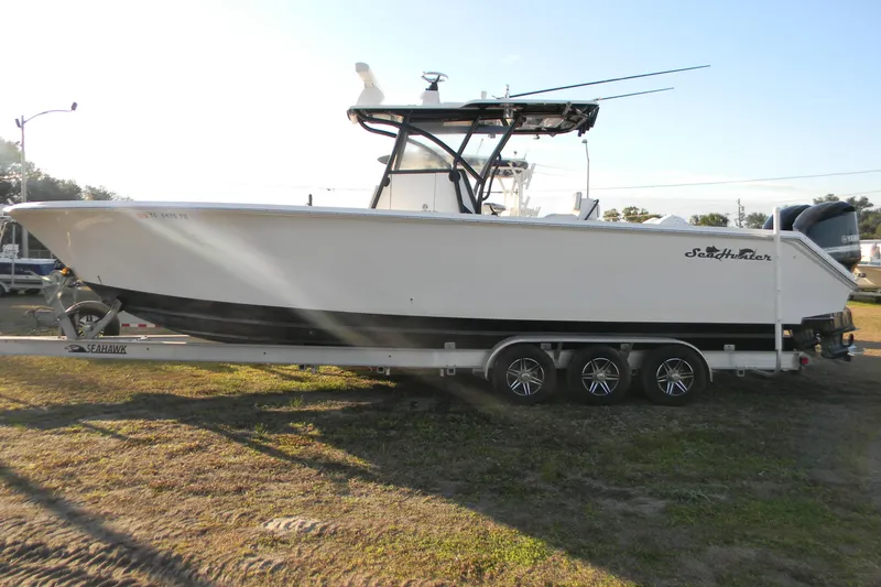 The Image of 2015 SeaHunter 35 Tournament boat on trailer, side view, outdoors. - 1