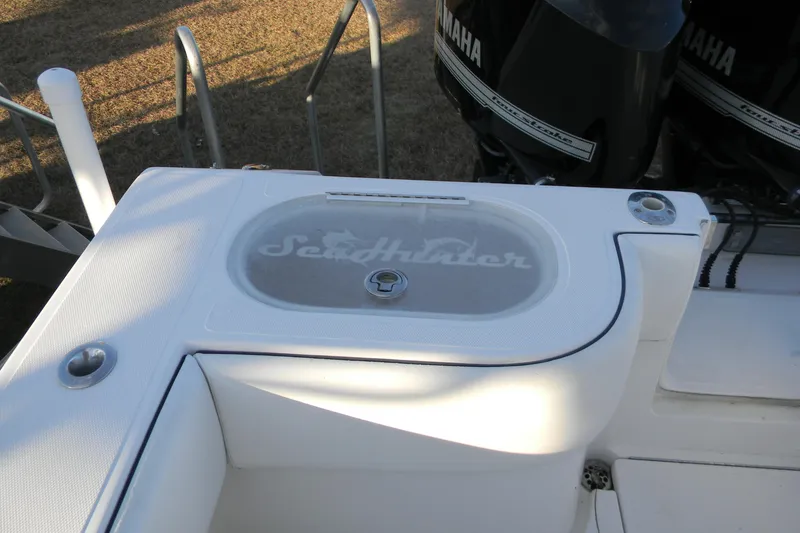 Slide: The Image of 2015 SeaHunter 35 Tournament boat with Yamaha engines, featuring a livewell. - 12