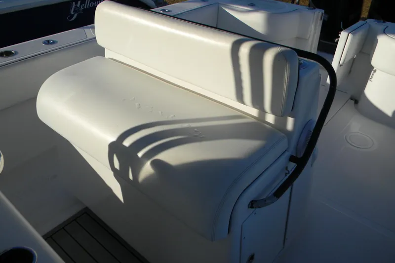 Slide: The Image of White seating on a 2015 SeaHunter 35 Tournament boat, featuring sleek design and comfort. - 15