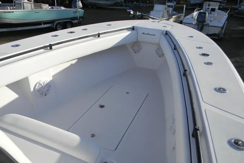 Slide: The Image of 2015 SeaHunter 35 Tournament boat interior with spacious seating and storage. - 18
