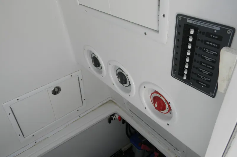 Slide: The Image of 2015 SeaHunter 35 Tournament boat electrical panel and controls. - 19