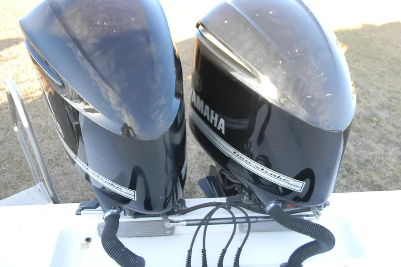 Slide: The Image of Twin Yamaha outboard motors on a 2015 SeaHunter 35 Tournament boat. - 5