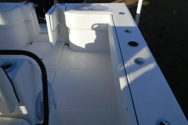 Slide: The Image of 2015 SeaHunter 35 Tournament boat interior with rod holders and seating area. - 8
